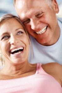 older couple smiling happily